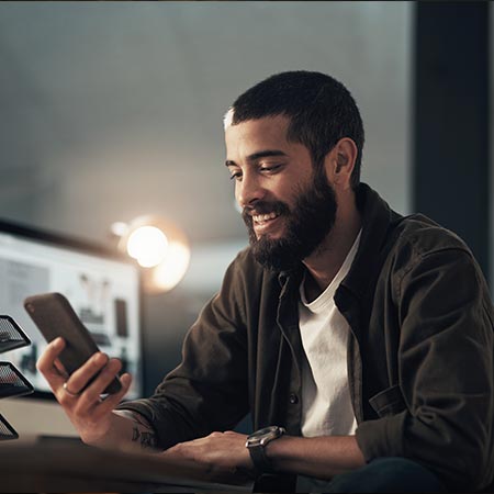 man looking at phone