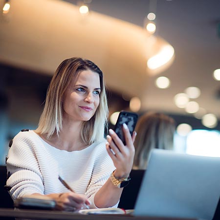 woman looking at phone